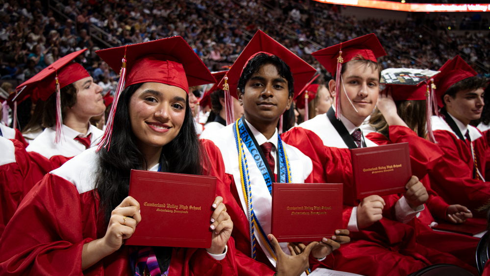 Cumberland Valley's Class of 2026 graduates hold their diplomas during the ceremony.