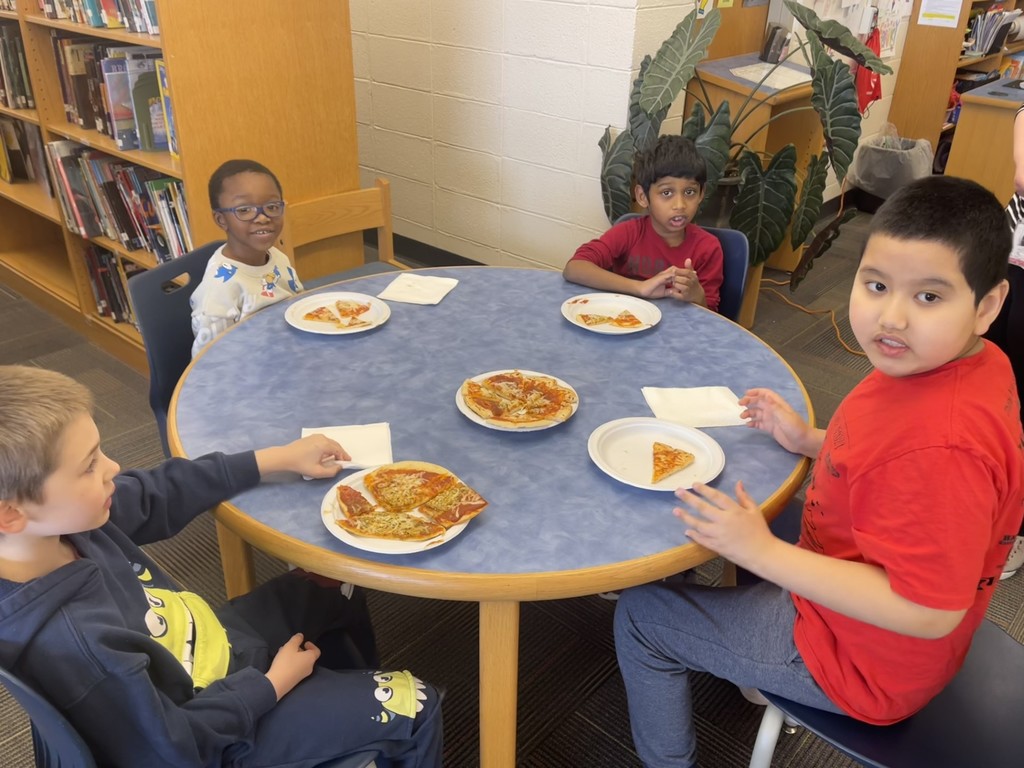 Monroe Elementary students enjoy their very own pizza party