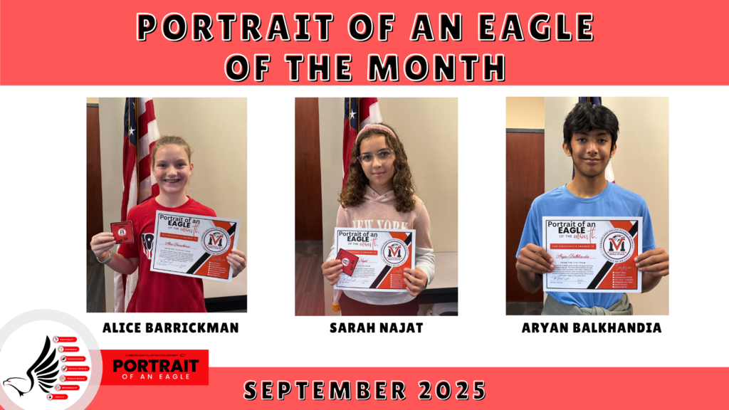 Students posing and holding a certificate for winning Portrait of an Eagle of the Month for September.