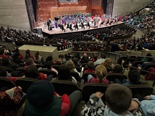 View of orchestra playing from seats in mezzanine
