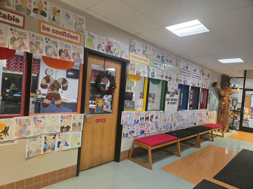 Silver Spring Elementary School lobby is filled with colorful pictures of Dr. Gilbert for his birthday.