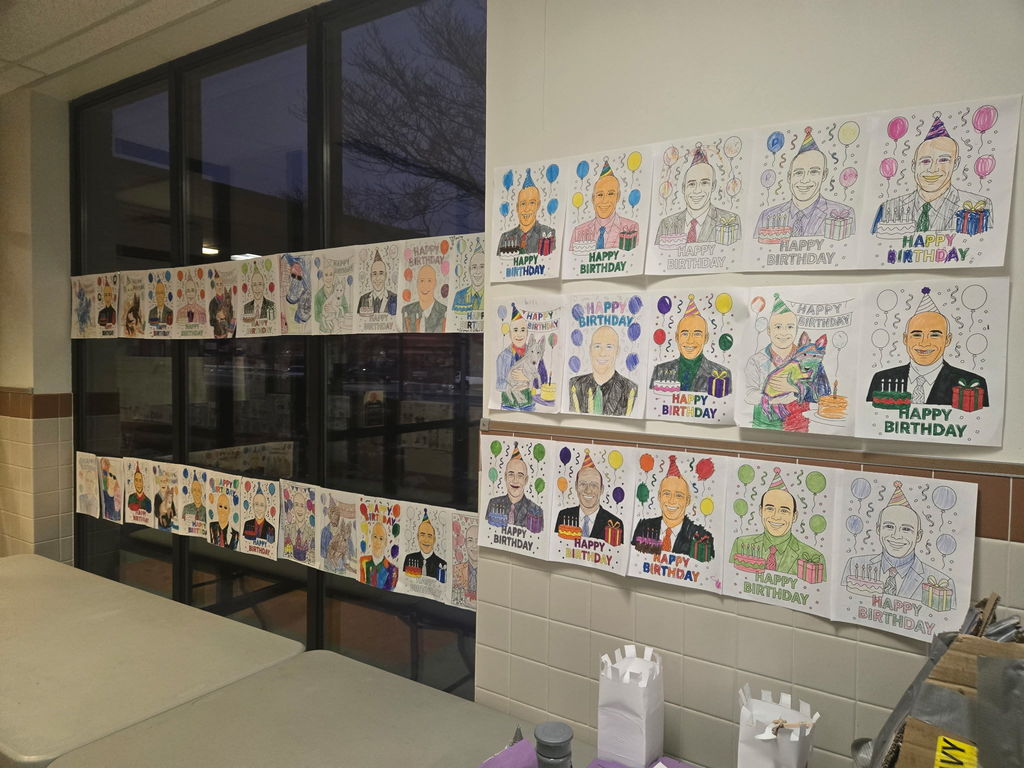Silver Spring Elementary School lobby is decorated with student-colored portraits of Dr. Gilbert to celebrate his birthday.