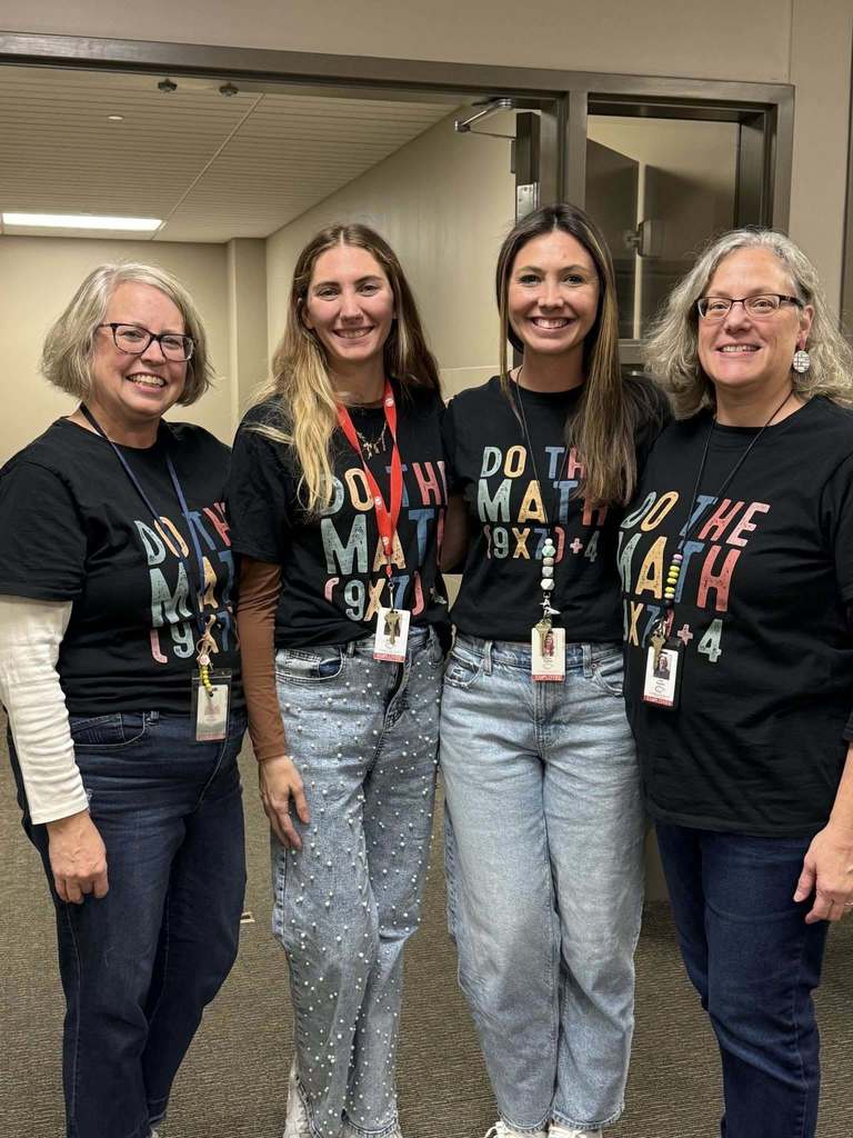 Four teachers wearing matching black “Do the Math” shirts with multiplication equations, celebrating the 67th day of school.