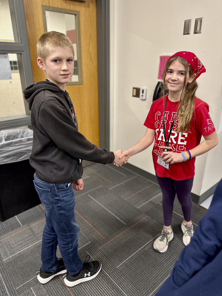House Leaders from Winding Creek and Middlesex Elementary participate in a hand-shake activity during their House Leader collaboration.