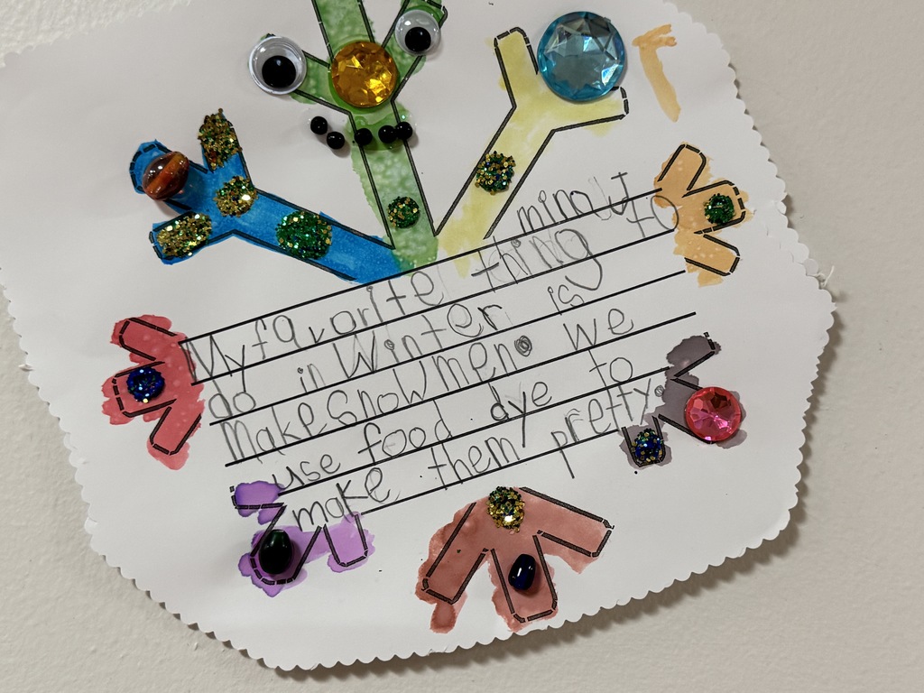 Multi-colored snowflake with googly eyes