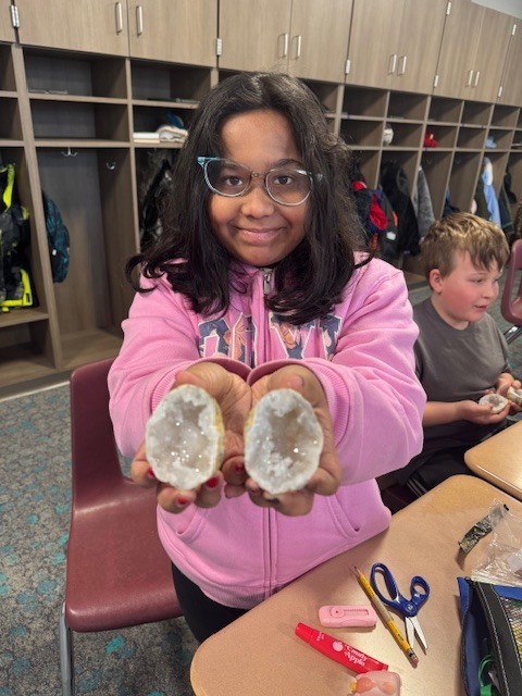 Green Ridge Elementary student shows off her geode that she received during a hands-on geology experience.
