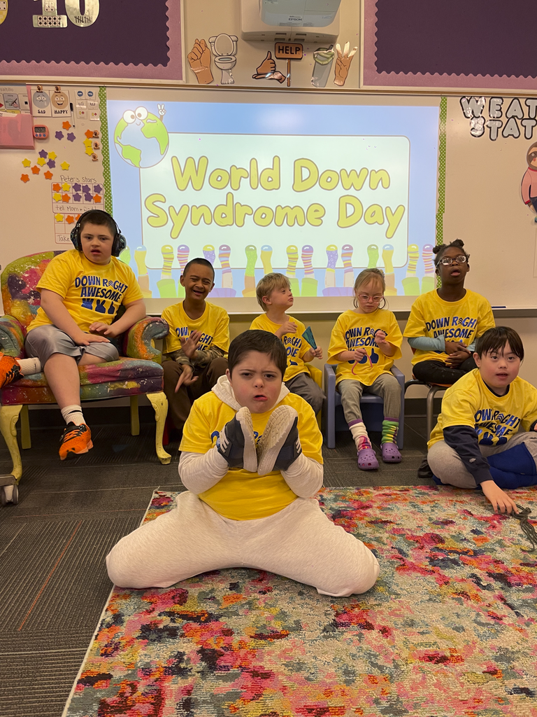 Students pose for a picture during World Down Syndrome Day.
