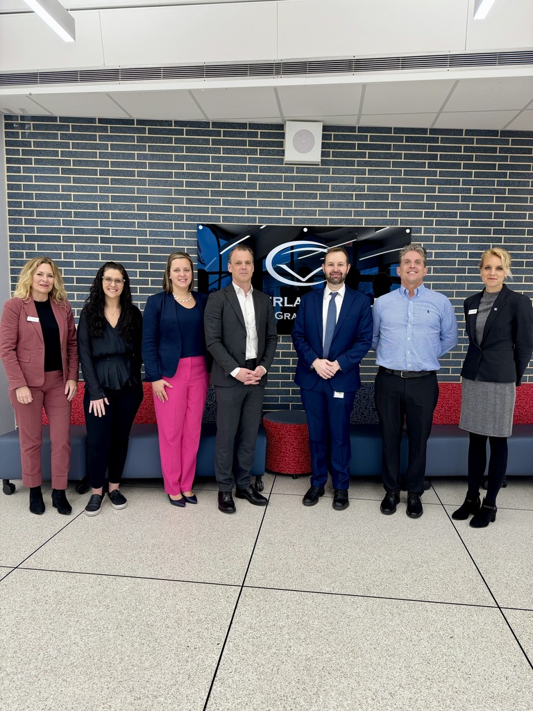 Administrators from Sweden pose with CV Administrators during their tour of the Cumberland Valley Ninth Grade Academy.