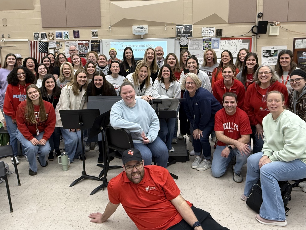 Ben Hartranft poses in a room full of CV staff after he delivered a powerful speech to kick off a PD day.