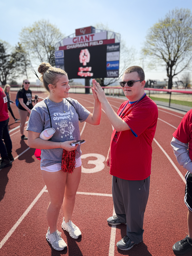Two students share a high-five during CV's Special Olympics.