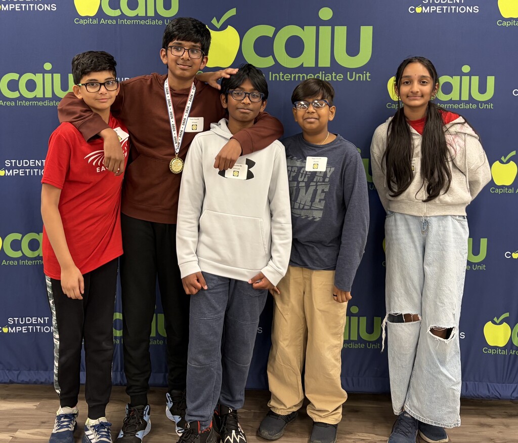 create short alt text for this image. Eagle View Middle School students showcased impressive math skills and outstanding character at the Math 24 Tournament hosted by the Capital Area Intermediate Unit. This is the 7th/8th grade team that placed 5th.