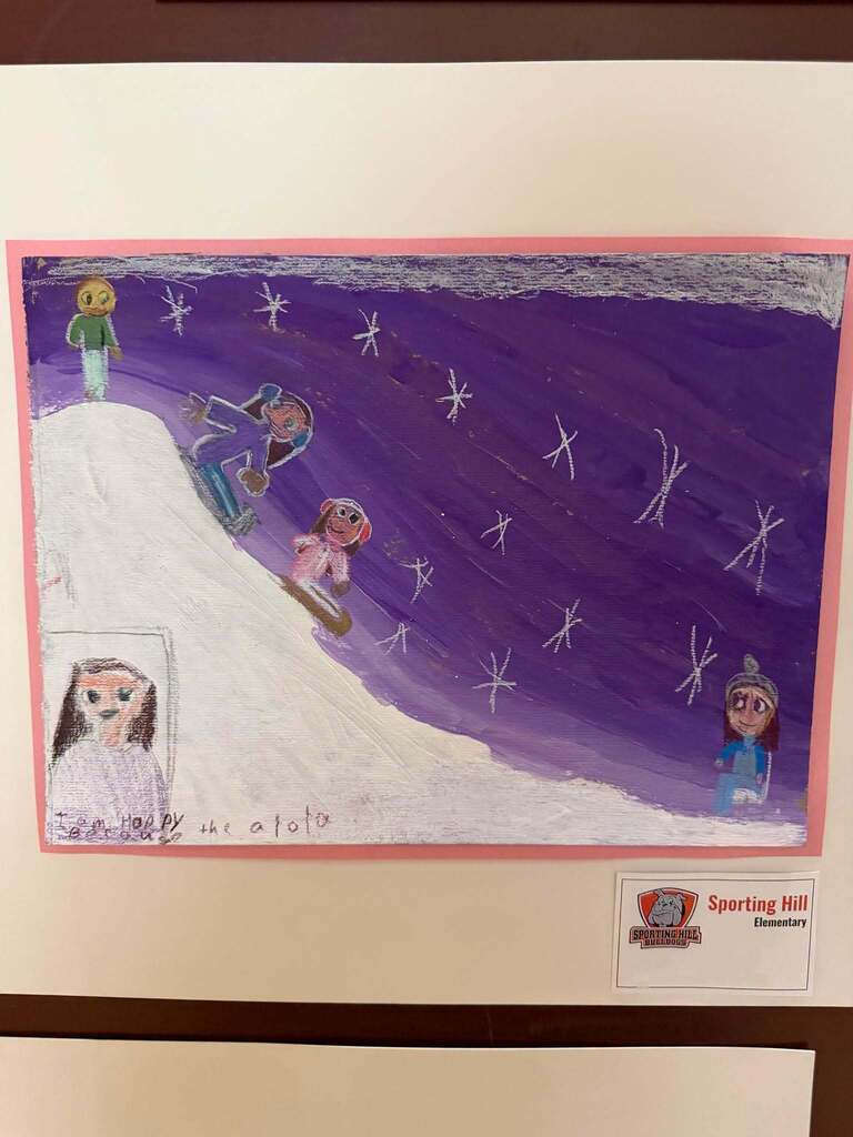 Child’s drawing of people sledding down a snowy hill under a purple night sky with stars, displayed with a Sporting Hill Elementary label.