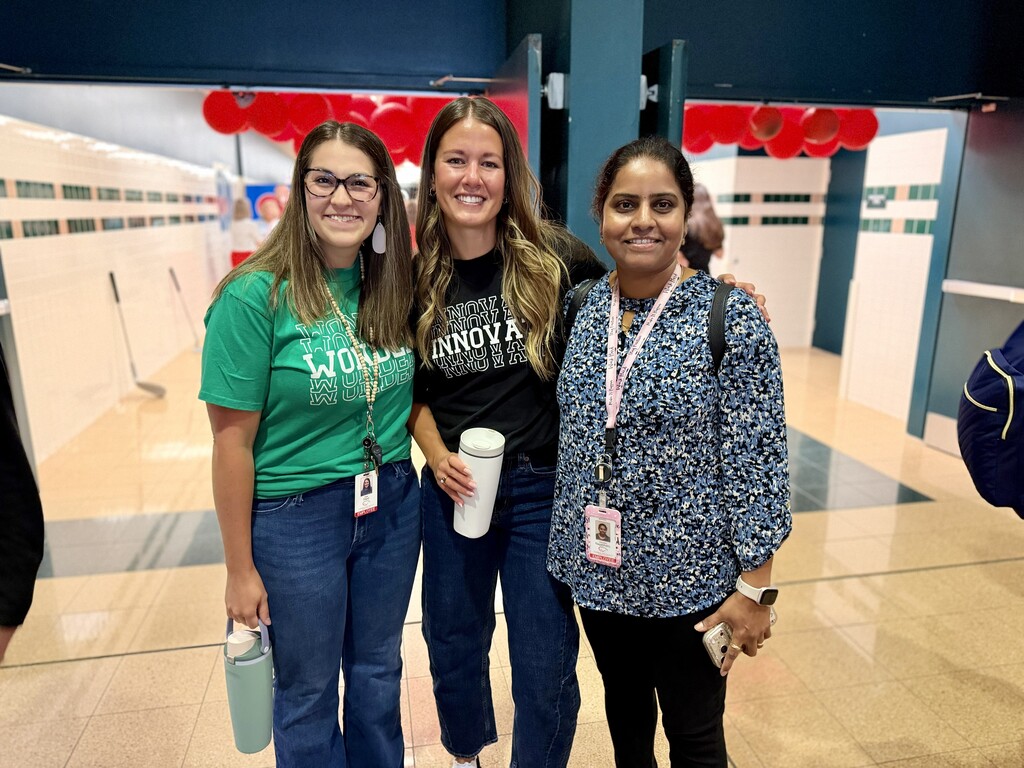 Three CV staff members gather for a photo in the Eagle lobby during the 2026-27 Convocation.