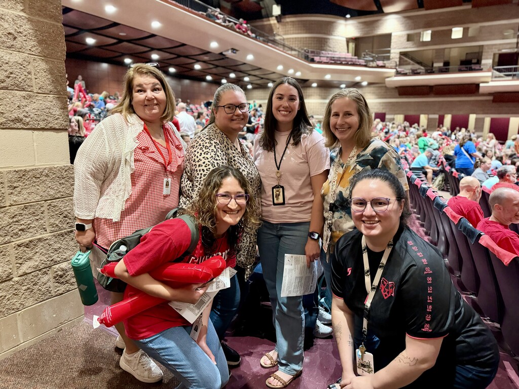 Staff members gather for a group photo in the Cumberland Valley High School Performing Arts Center during the 2026-27 Convocation.