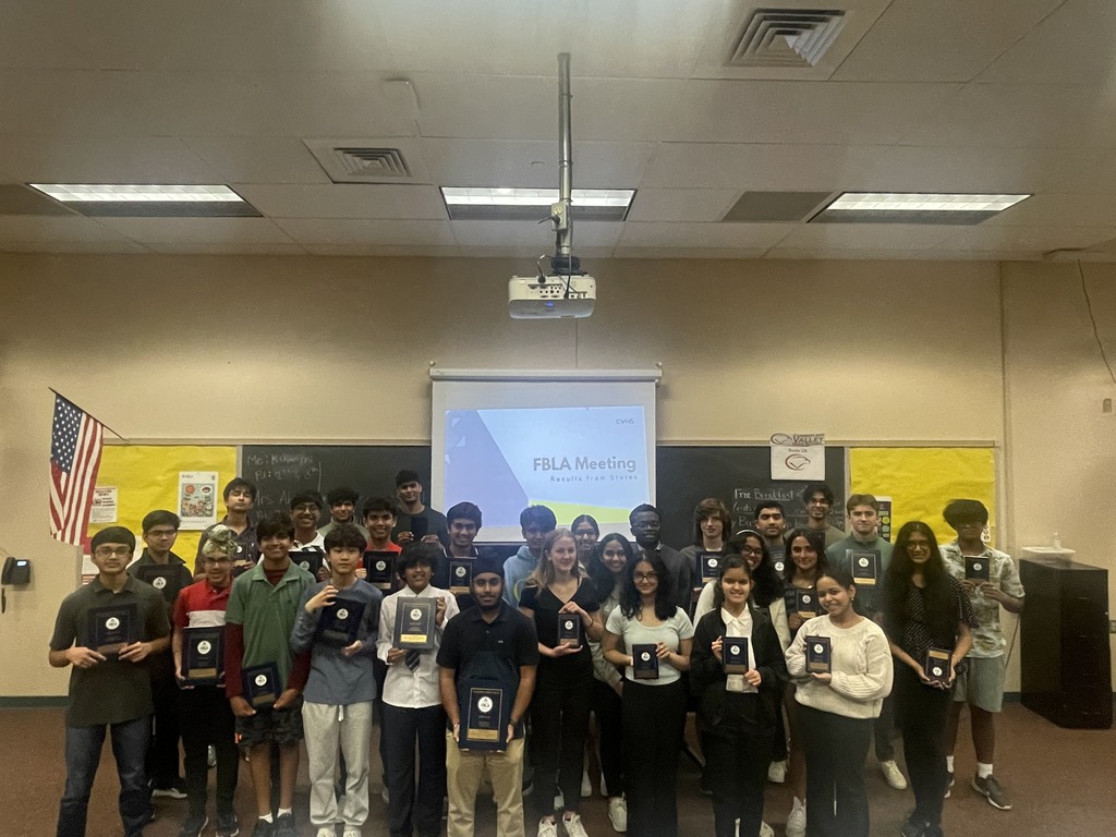 Group of students with awards