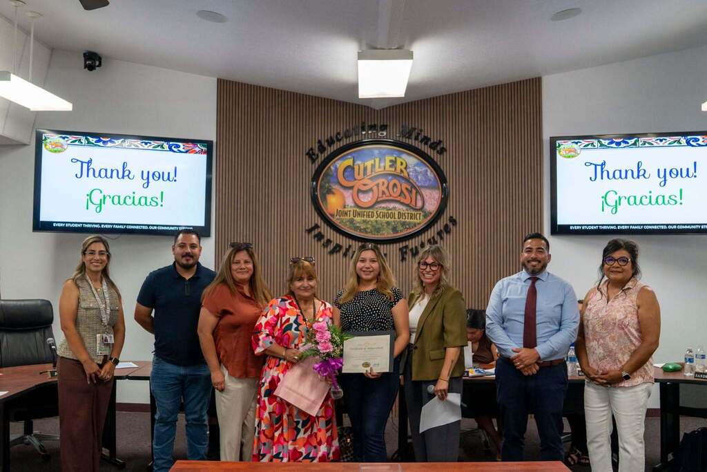 family and staff honor teacher