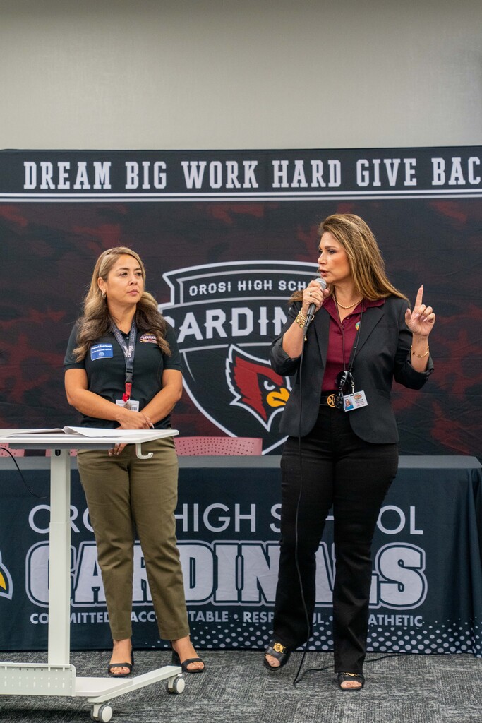 Marisol Rodriguez, Community School Coordinator, and Yolanda Valdez, Superintendent, speaking at the secondary redesign hosted by OHS 