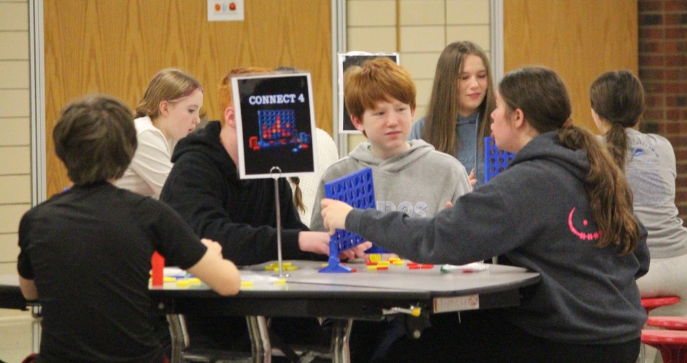 Students play Connect 4.