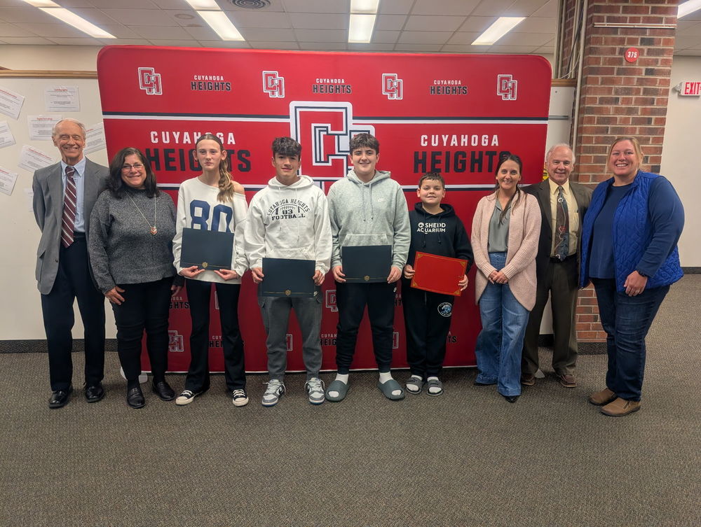 Students of the Month and BOE members.