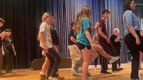 Students practicing choreography.