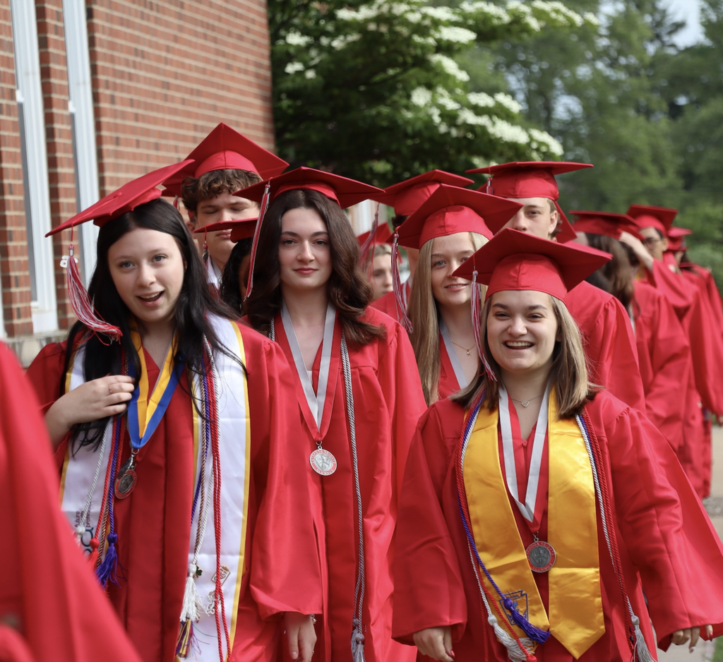 graduates walking out
