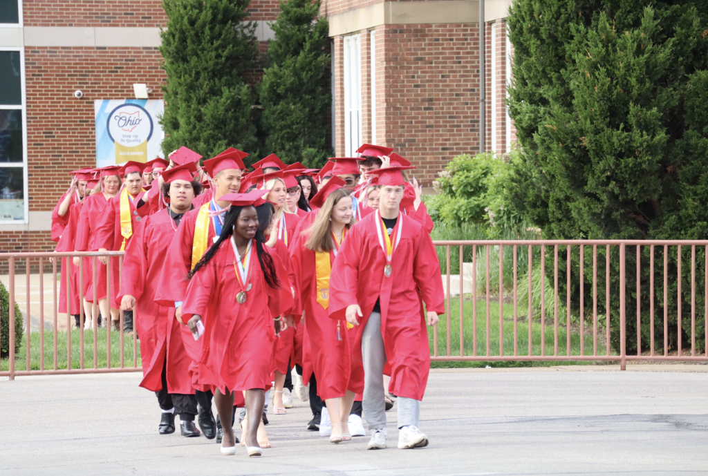 graduates walking out