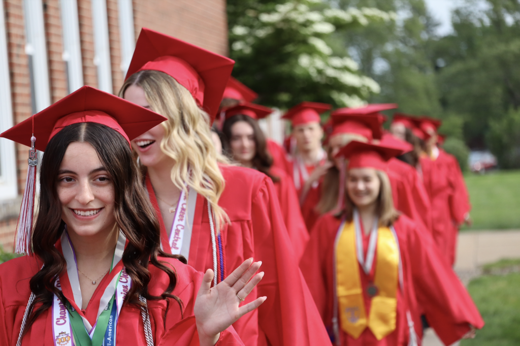 graduates walking out