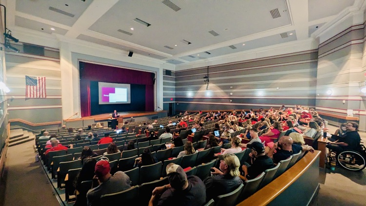 Superintendent Young addressing staff at opening day convocation  