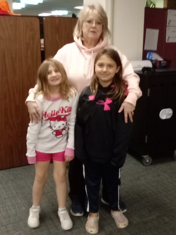 Two students with grandmother.