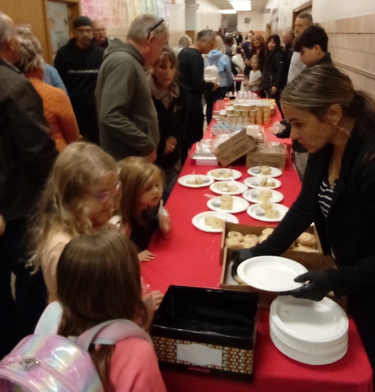 Guests and students get refreshments