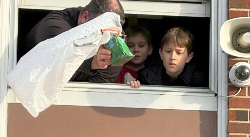 Max L. and Mikey C look on as&nbsp; Principal Joel Melvin drops their egg.