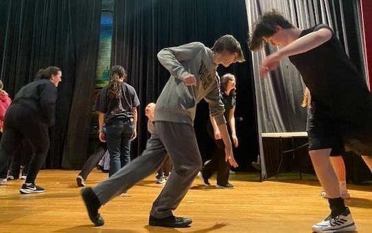 Boys practicing choreography. 