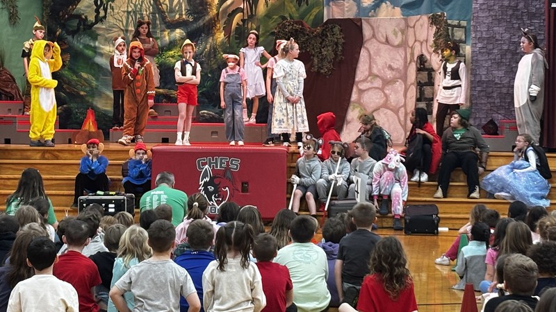 Students perform "Shrek The Musical -- Kids"