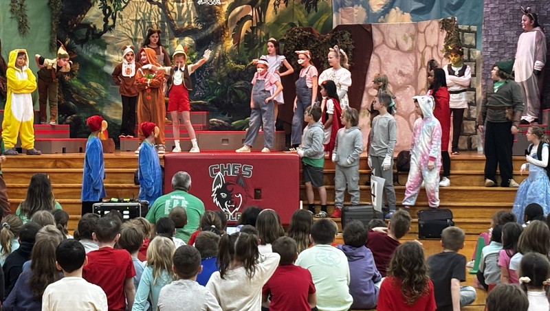 Students perform "Shrek The Musical -- Kids"