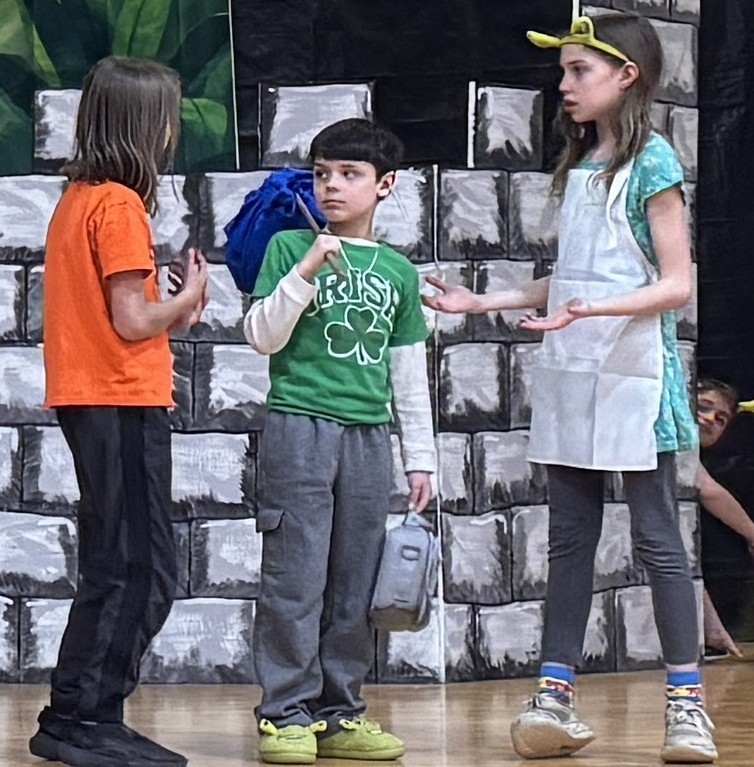 Students perform "Shrek The Musical -- Kids"