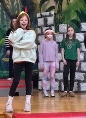 Students perform "Shrek The Musical -- Kids"