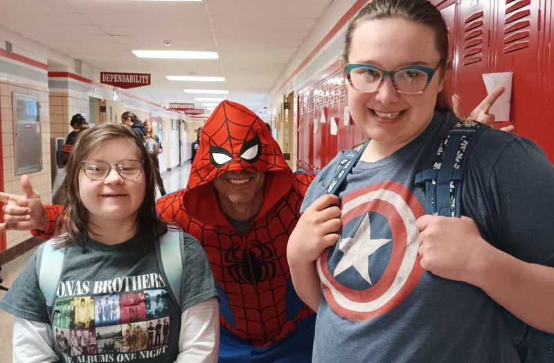 Spiderman (teacher Michael Tartara) with students. 