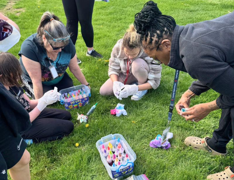 Students enjoy tie-dying items at Inclusion Mixer. 