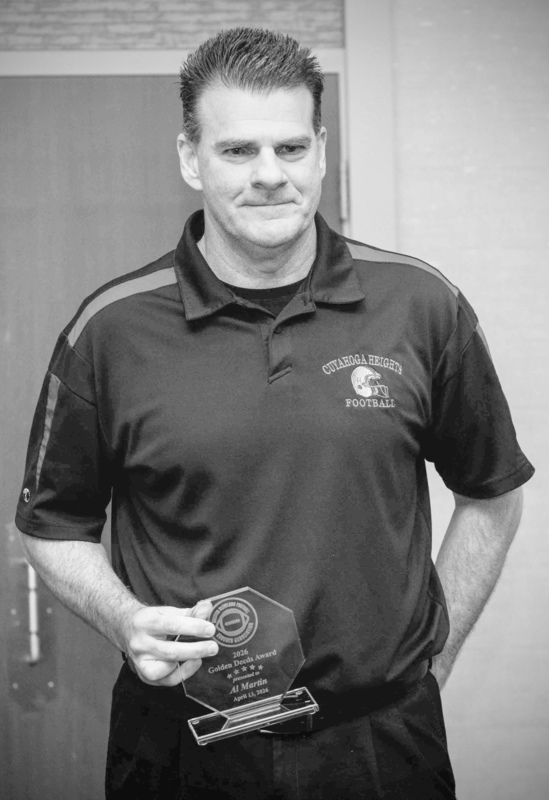 Coach Martin with his award.