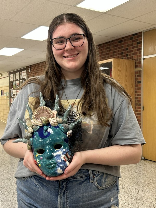 Jemma D'Amico and her ceramic mask. 