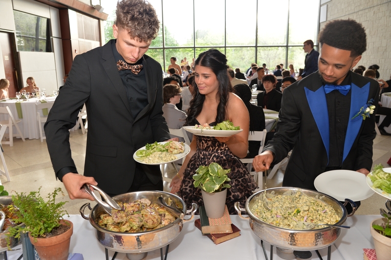 Students at buffet line. 