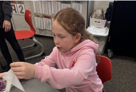 Girl making rocket