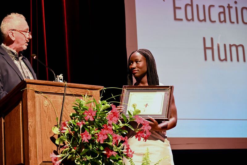 Humanitarian Award recipient Mariama Hopkins  and Steve Ruguski from the Educational Service Center. who presented the award. 