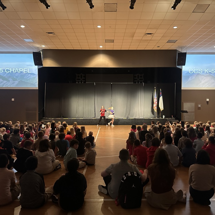 middle school students introduced the speaker Mr. Jameson