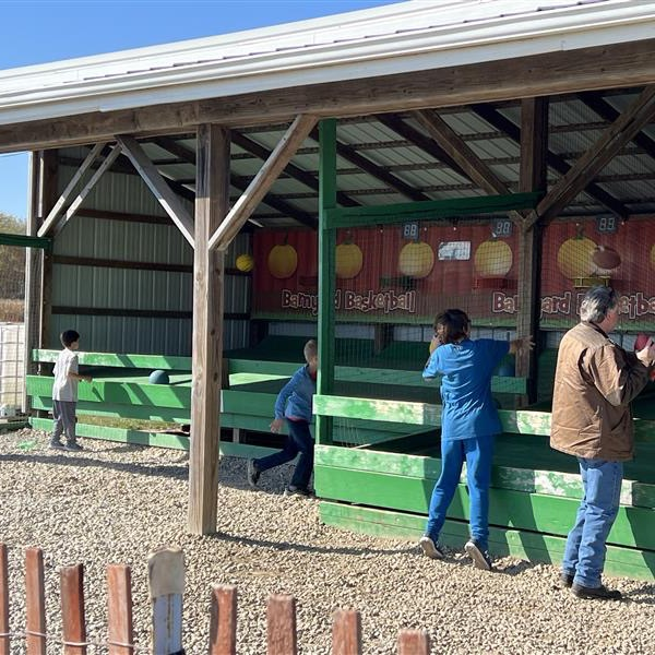 fifth grade students, and their chaperones playing on a field trip