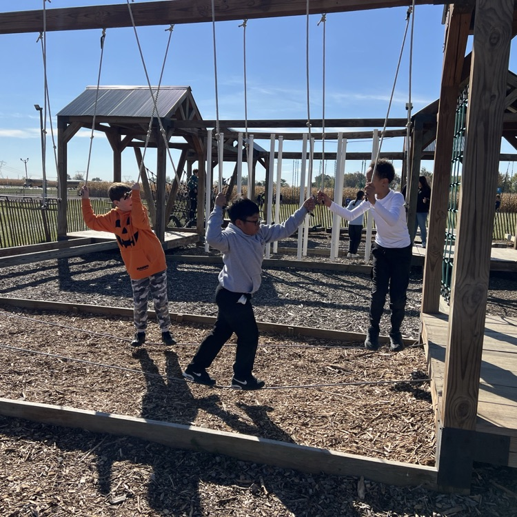 fifth graders playing outside on a field trip