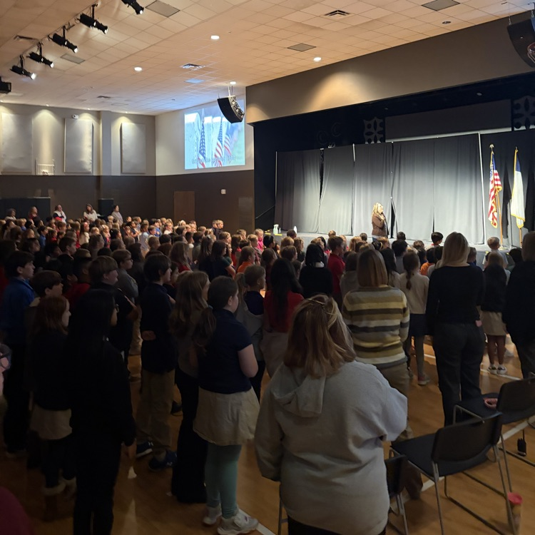students and staff saying pledges
