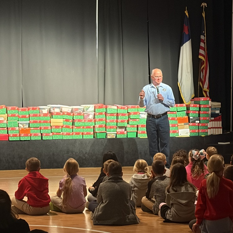 Mr. John speaking to students about OCC boxes