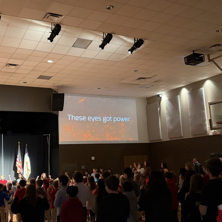 students worshipping at chapel