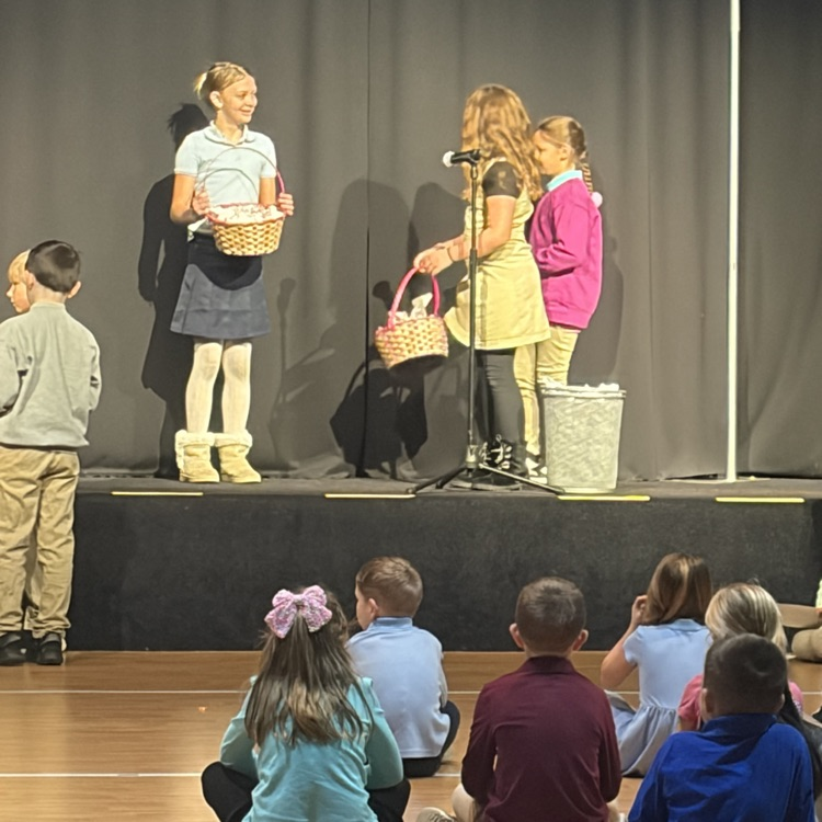 students demonstrate bucket filling/spilling